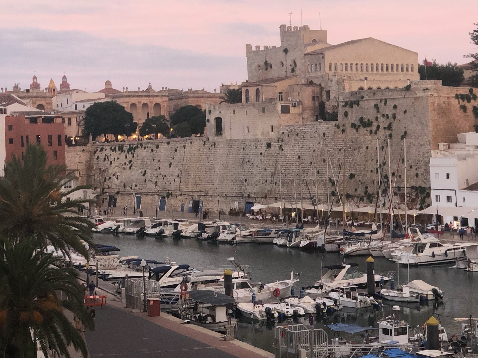 Menorca’s historic harbor at dusk