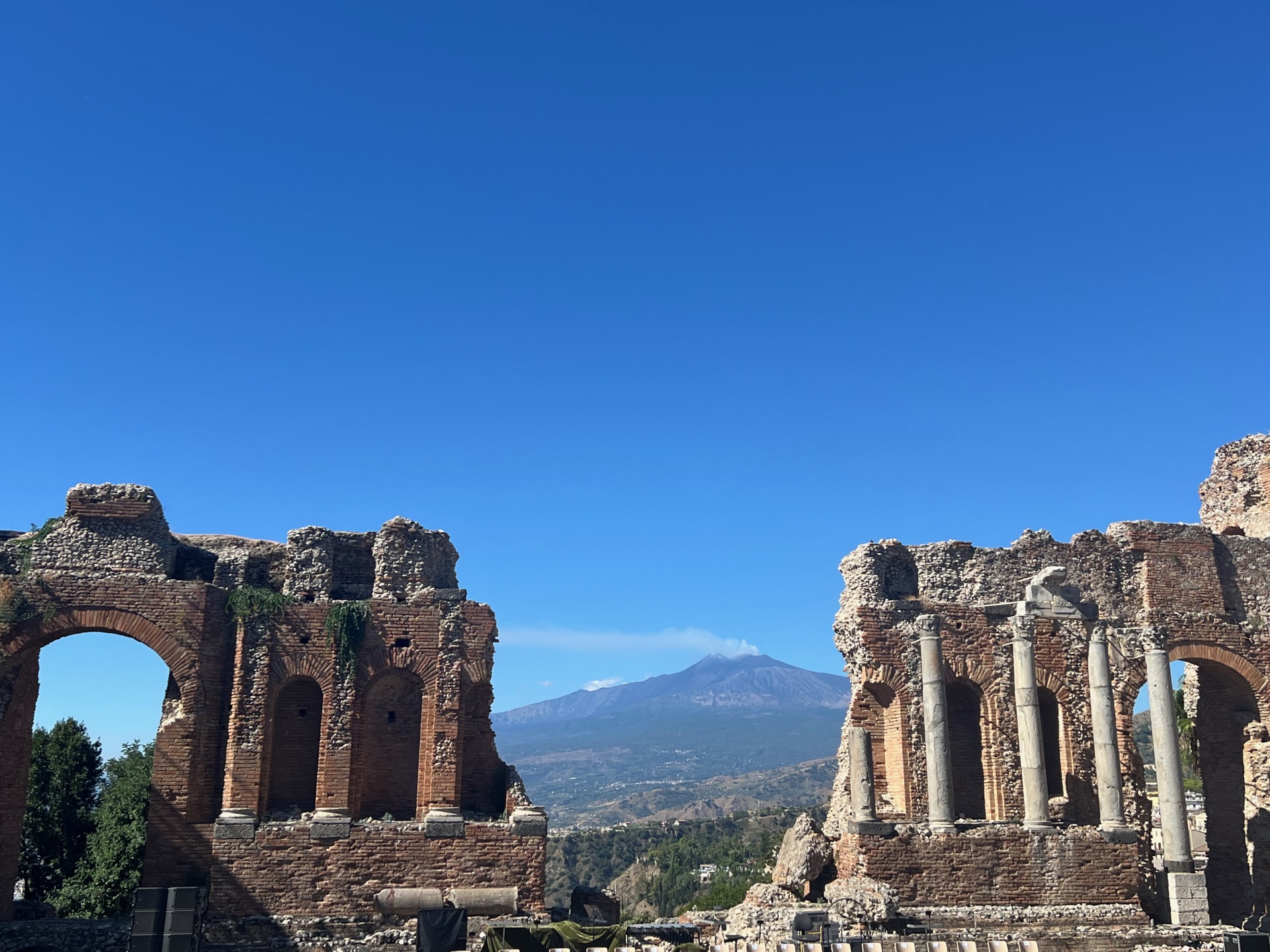 Ancient Greek Theatre in Taormina with Mt. Etna